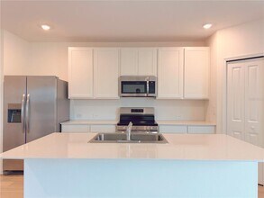 6481 DOMIZIO Dr in Cypress Gardens, FL - Building Photo - Building Photo