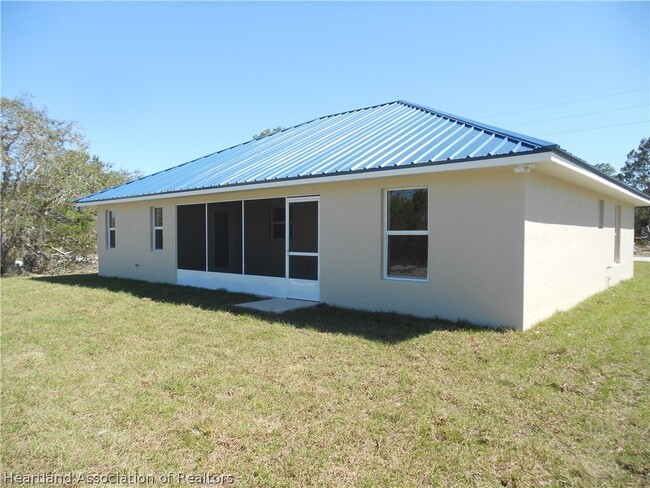 824 Lincoln Rd NE in Lake Placid, FL - Building Photo - Building Photo