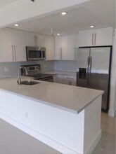 1470 NE 123rd St, Unit A413 in North Miami, FL - Foto de edificio - Building Photo