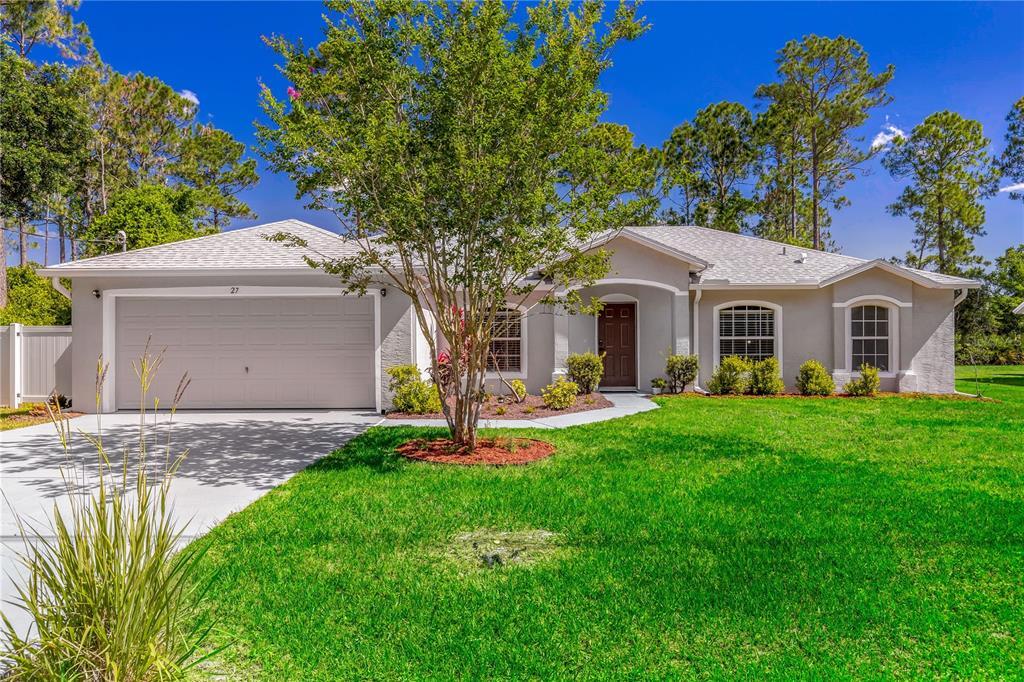 27 Laguna Forest Trail in Palm Coast, FL - Building Photo