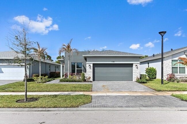11381 SW Lyra Dr. in Port St. Lucie, FL - Building Photo - Building Photo