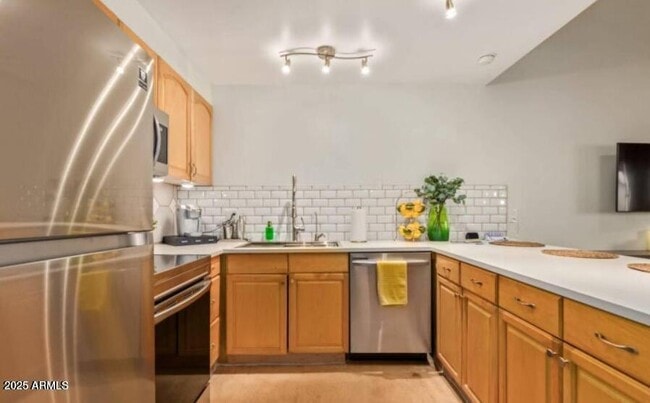 property at 8055 E Thomas Rd