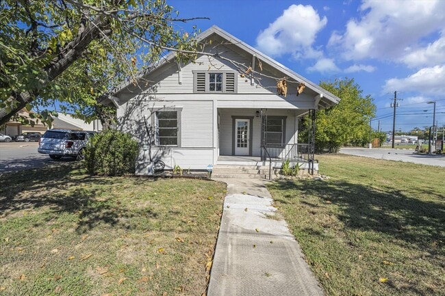 property at 107 W 1st St