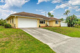 6130 Francis St in Jupiter, FL - Foto de edificio - Building Photo