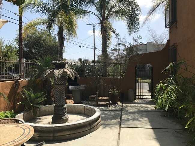 1415 S Sierra Bonita Ave in Los Angeles, CA - Building Photo - Building Photo