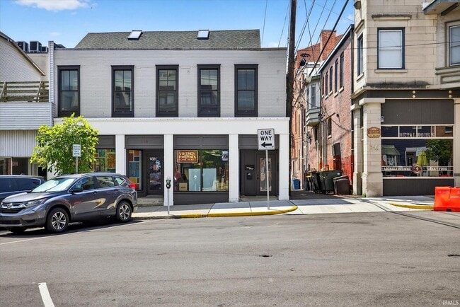 property at 114 E 6 St