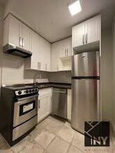 102 Fulton St in New York, NY - Building Photo - Building Photo