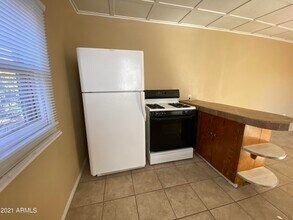 1037 N 25th St in Phoenix, AZ - Foto de edificio - Building Photo