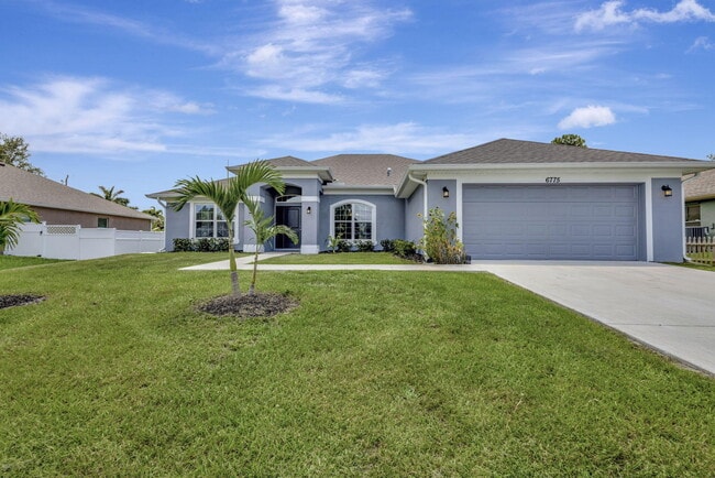 property at 6775 NW Abigail Ave