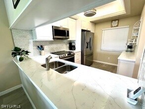 14891 Hole-In-One Cir in Ft. Myers, FL - Building Photo - Building Photo