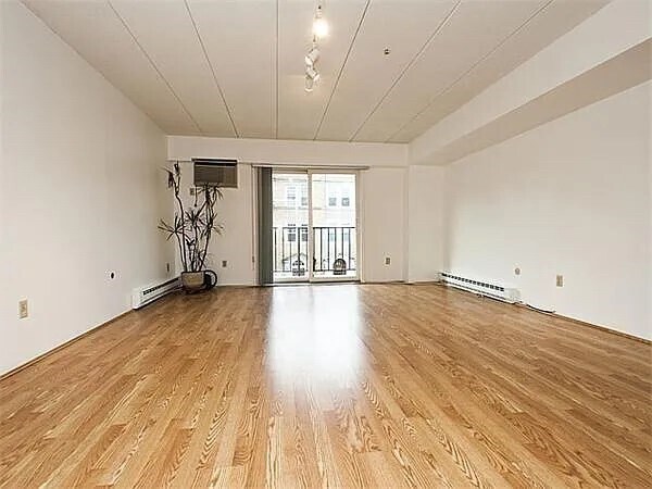 140 Pleasant St, Unit 309 in Brookline, MA - Building Photo