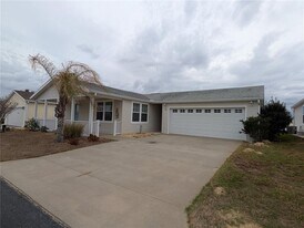 9101 Fairway Loop in Dade City, FL - Building Photo