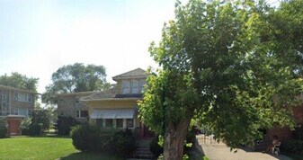 13934 S Edbrooke Ave in Riverdale, IL - Building Photo