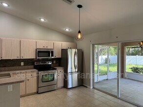3928 Champagne Ave in North Port, FL - Building Photo - Building Photo