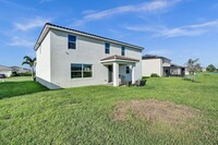 12623 NW Copper Creek Dr in Port St. Lucie, FL - Foto de edificio - Building Photo