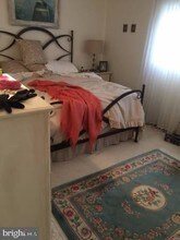 7857 Enola St-Unit -106 in McLean, VA - Building Photo - Building Photo