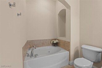 1248 Carpazi Ct in Naples, FL - Building Photo - Building Photo