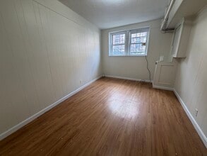 131 Sutherland Rd, Unit A in Boston, MA - Foto de edificio - Building Photo