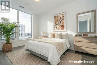 7439 Kingston Rd in Toronto, ON - Building Photo - Building Photo