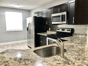 8761 Wiles Rd in Coral Springs, FL - Building Photo - Building Photo