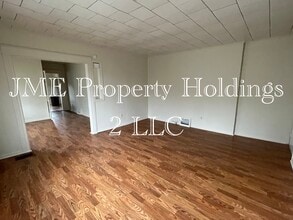 113 W Young St, Unit #1 Main Floor Unit in Clio, MI - Foto de edificio - Building Photo