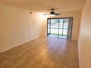 11453 NW 39th Ct, Unit 111 in Coral Springs, FL - Building Photo - Building Photo