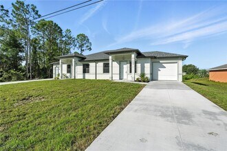 4881-4883 Leonard Blvd S in Lehigh Acres, FL - Foto de edificio - Building Photo