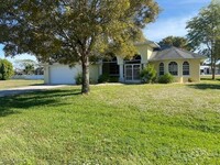 3401 SW 25th Pl in Cape Coral, FL - Foto de edificio - Building Photo