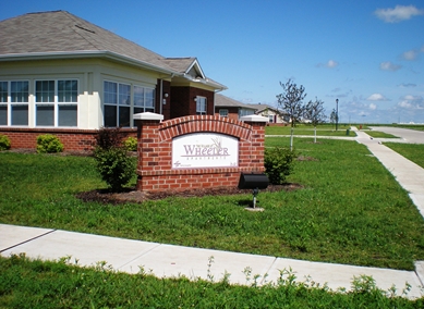 The Village at Wheeler Apartments in Macomb, IL - Building Photo