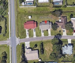 406 Cocoa Ct in Poinciana, FL - Building Photo