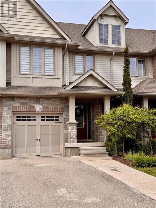 1156 Caen Ave in Woodstock, ON - Building Photo