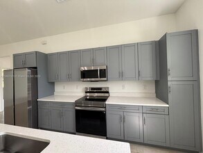 1018 Maddock St E in Lehigh Acres, FL - Building Photo - Building Photo