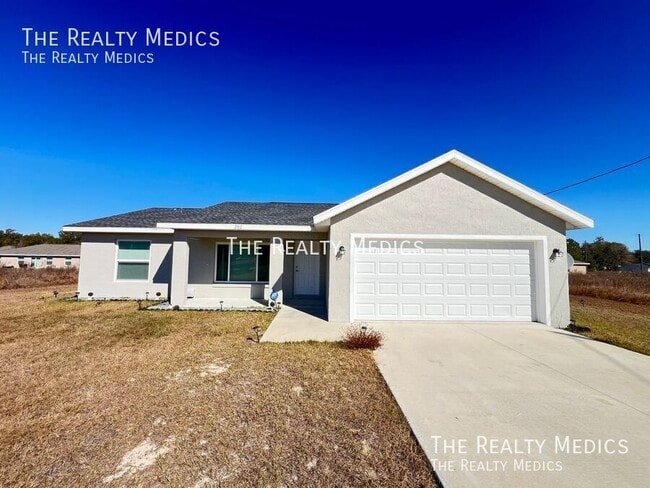 297 Malauka Loop in Ocklawaha, FL - Building Photo - Building Photo