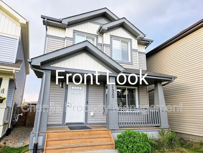 property at 2420-2418 18 Ave NW