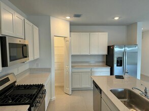 5892 NW Sweetwood Dr in Port St. Lucie, FL - Building Photo - Building Photo