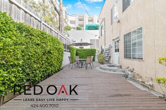 723 S Mansfield Ave in Los Angeles, CA - Building Photo - Building Photo