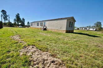 318 Rd 51023 in Cleveland, TX - Building Photo - Building Photo