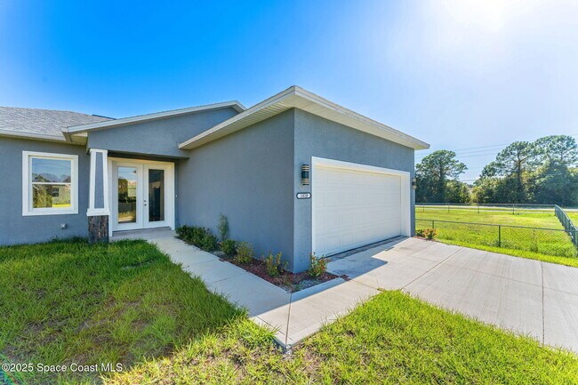 1410 Towton St SE in Palm Bay, FL - Building Photo - Building Photo