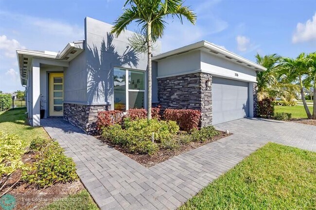 property at 11716 SW Lyra Dr.