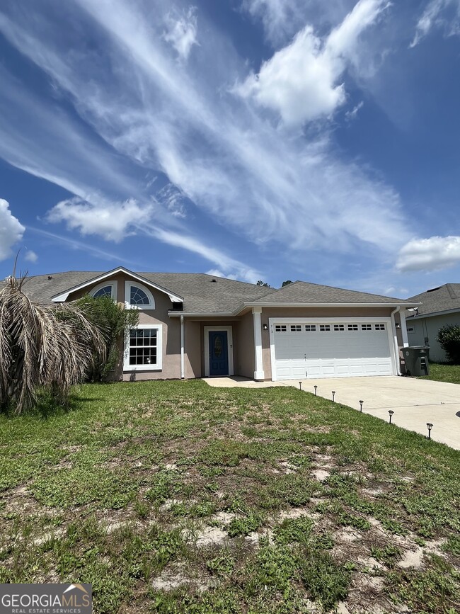 property at 213 Royal Palms Ave