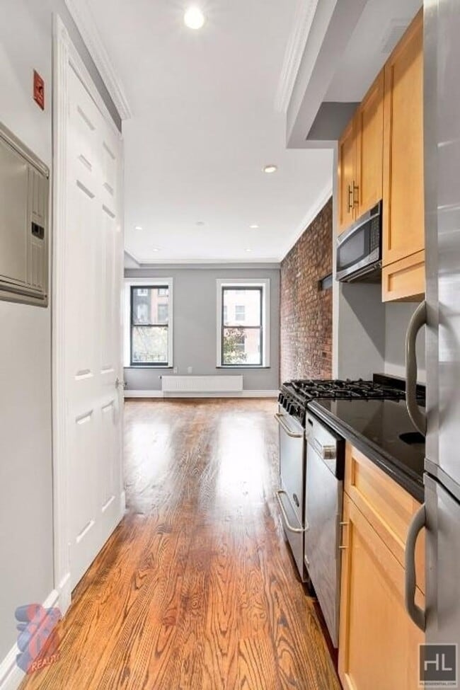 E 13TH ST., Unit 2E in New York, NY - Building Photo - Building Photo