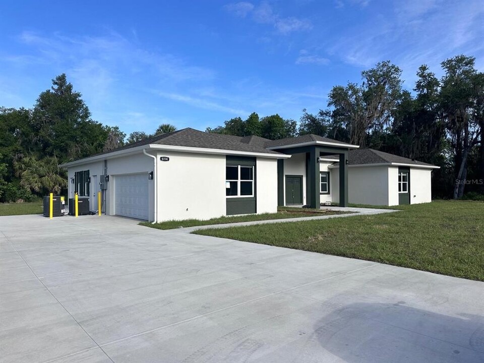 6114 DALLAS in Alafaya, FL - Building Photo