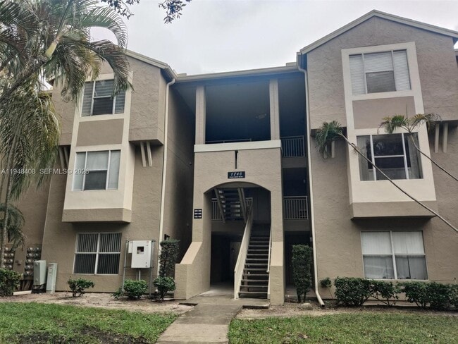 property at 1740 Palm Cove Blvd