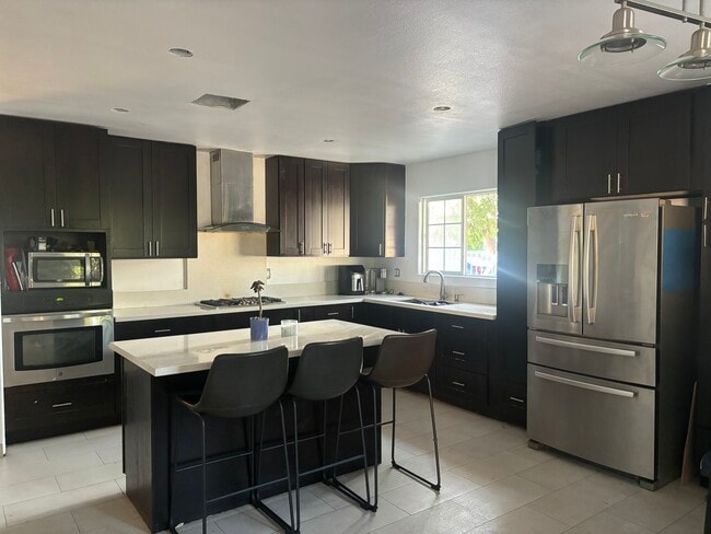 property at 9020 Roslyndale Ave