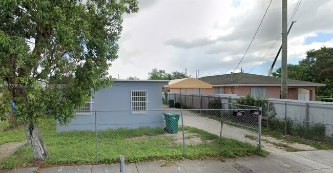 property at 564 NW 13th St