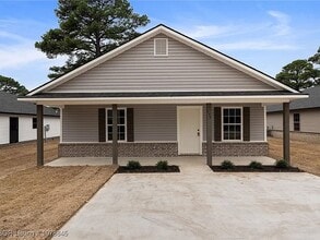 209 Coggins Ave in Poteau, OK - Building Photo - Building Photo