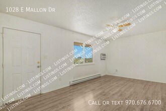 1028 E Mallon Dr in Pueblo West, CO - Building Photo - Building Photo