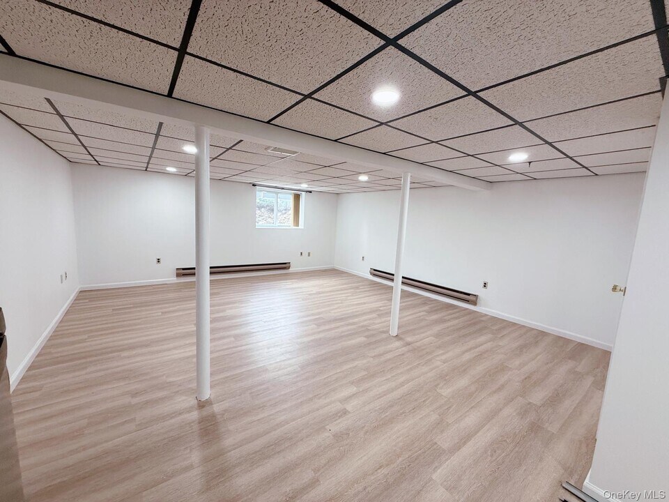 12 Bruce Dr in Centereach, NY - Building Photo