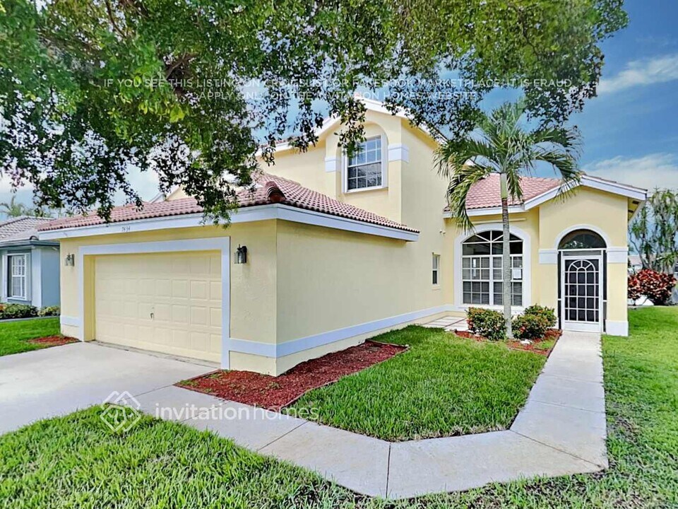 7434 Michigan Isle Rd in Greenacres, FL - Building Photo