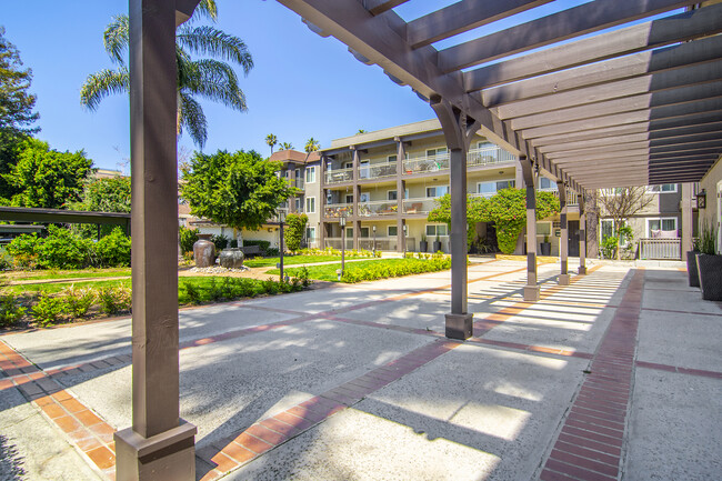 The Olive Tree Apartments in Van Nuys, CA - Building Photo - Building Photo